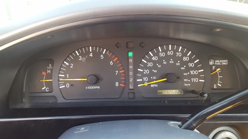 The new replacement gauge cluster and the incorrect mileage of 126,826 miles.
